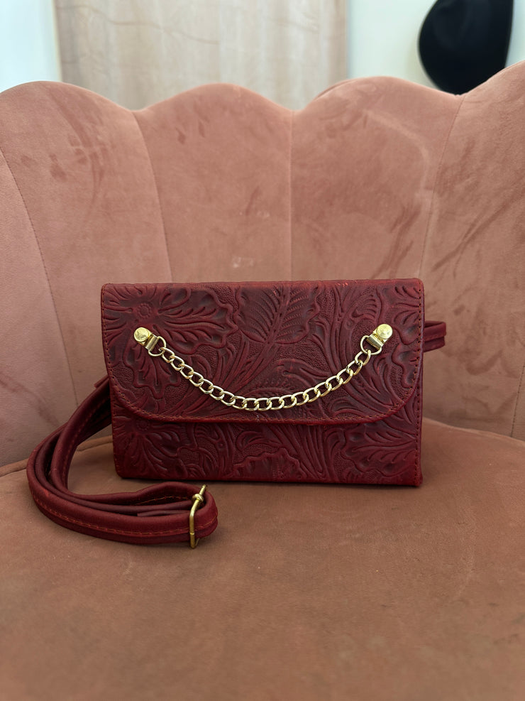 Small red purse with gold chain