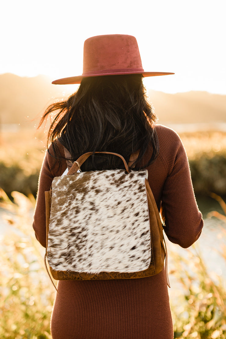 square brown cowhide backpack