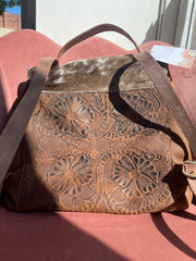 square brown cowhide backpack